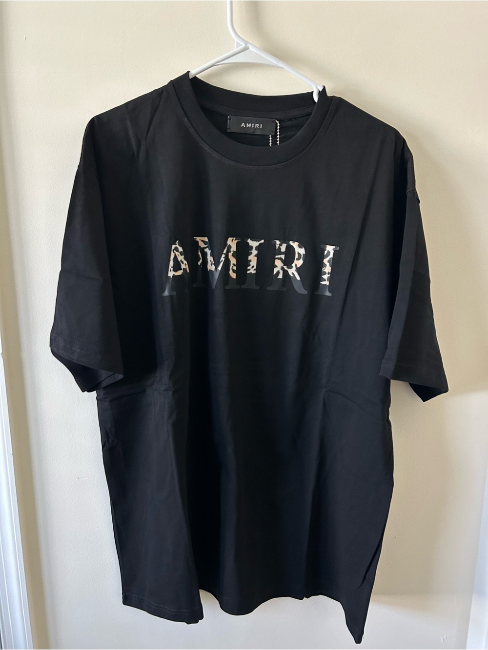 AMIRI Black Tee with Camo Lettering